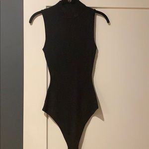 Black turtleneck bodysuit